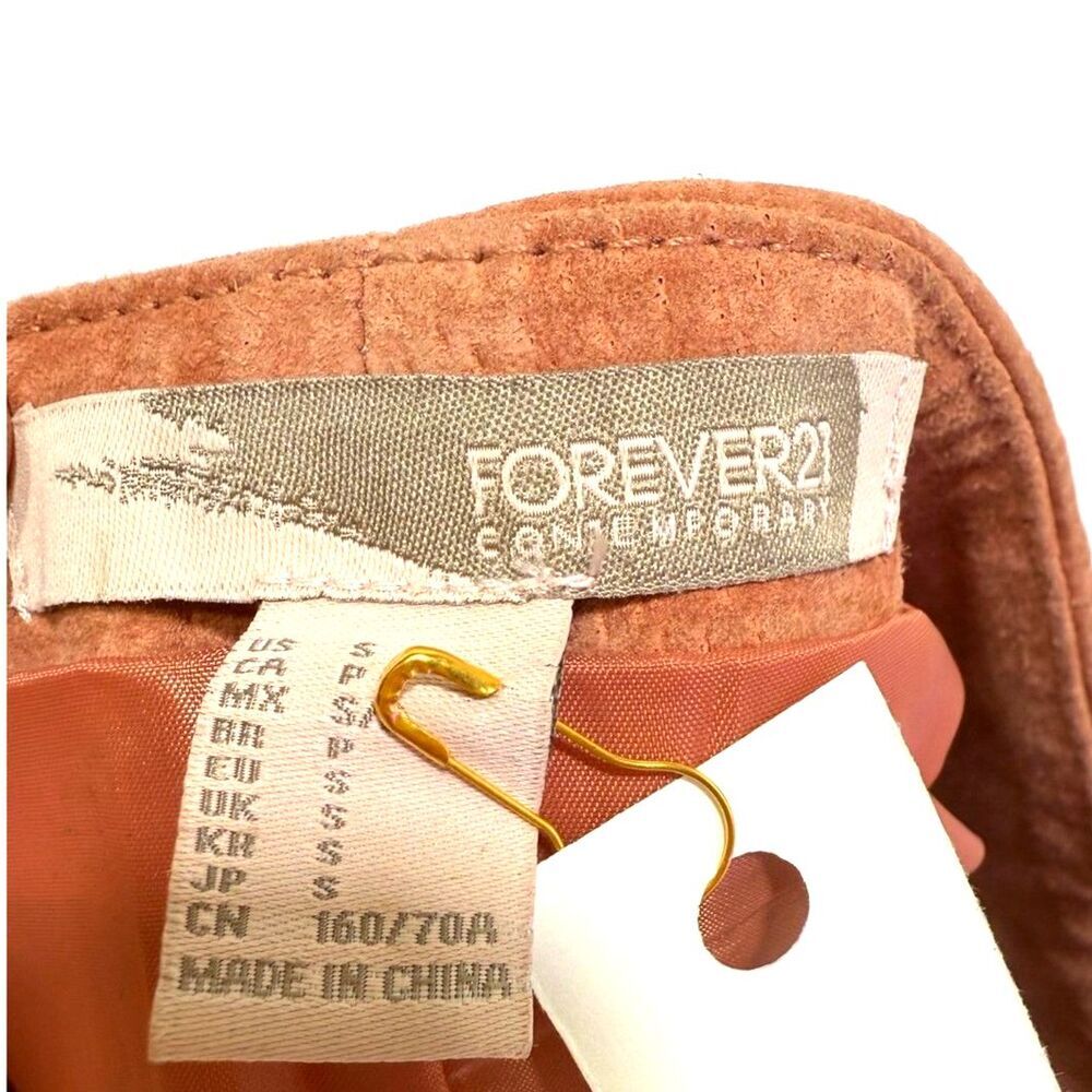 Forever 21 leather mini with center zipper; 70s retro vibes