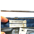 one x oneteaspoon	medium wash distressed jean shorts, size 25