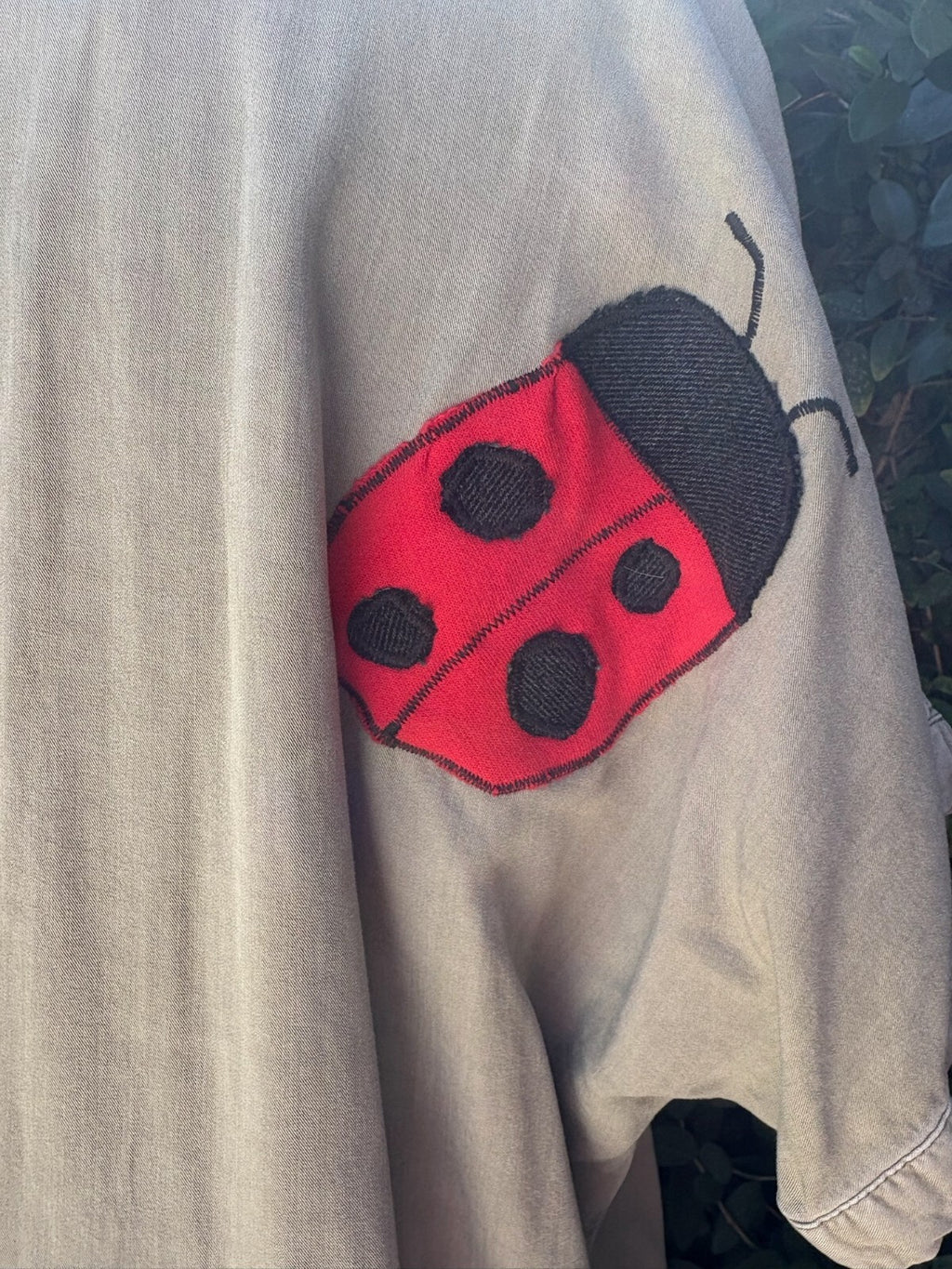 Upcycled chambray shirt dress daisy ladybug appliqué