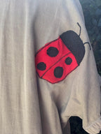Upcycled chambray shirt dress daisy ladybug appliqué