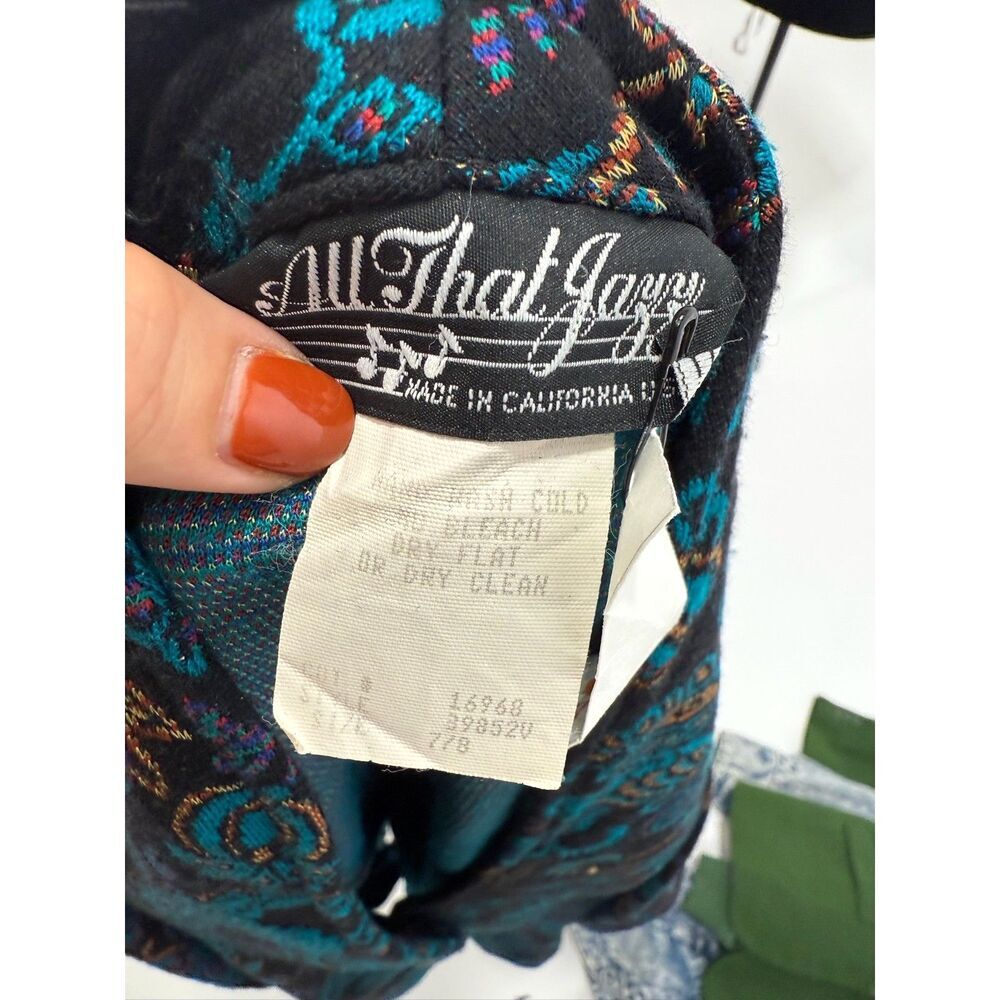 All That Jazz 90s black button up peplum blazer with teal paisley print