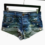 one x oneteaspoon	medium wash distressed jean shorts, size 25