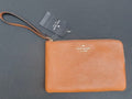 Kate Spade	NWT warm ginger pebble leather wristlet KB684